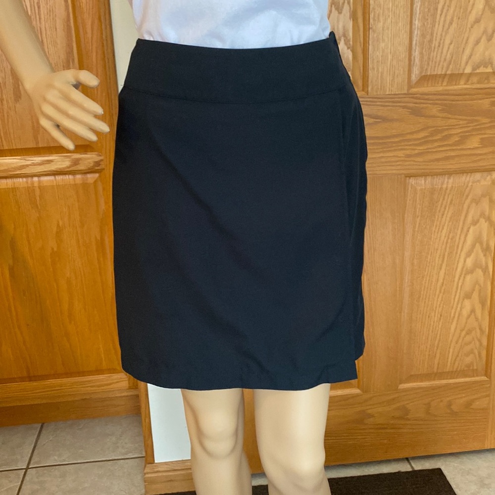 LizGolf black skirt with back pocket and front flap with button